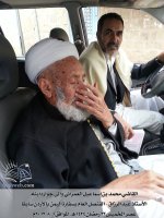 2ـ القاضي مع ابنه.jpg